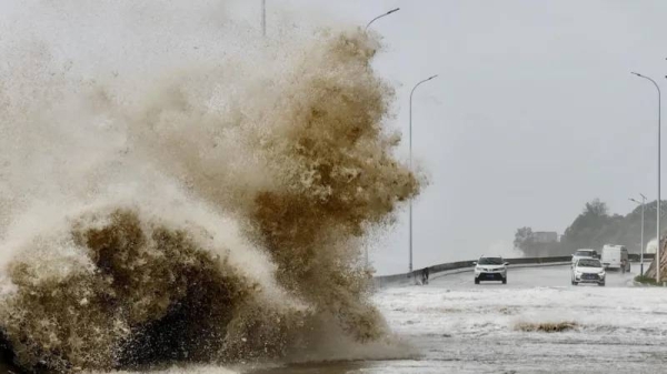 Waves crash on the coast of Sansha town, Fujan Province, as Typhoon Gaemi approaches