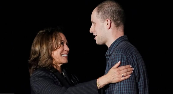 Vice President Kamala Harris greets Wall Street Journal reporter Evan Gershkovich on his arrival at Joint Base Andrews in Maryland