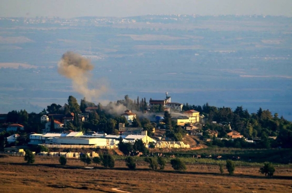 Smoke billows at the Israeli-Lebanon border from the site of a rocket fired from the Lebanese side, towards the Israeli village of Metullah on Saturday