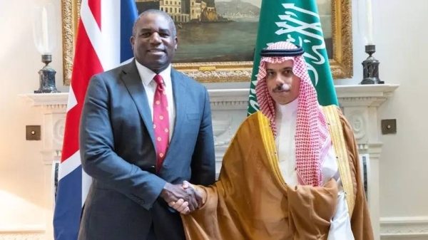 Prince Faisal bin Farhan with UK's David Lammy in London.