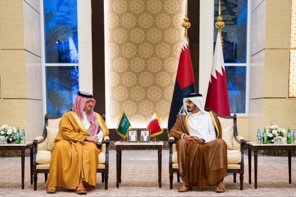 Saudi and Qatari Interior Ministers during their meeting at the Ministry's headquarters in Doha