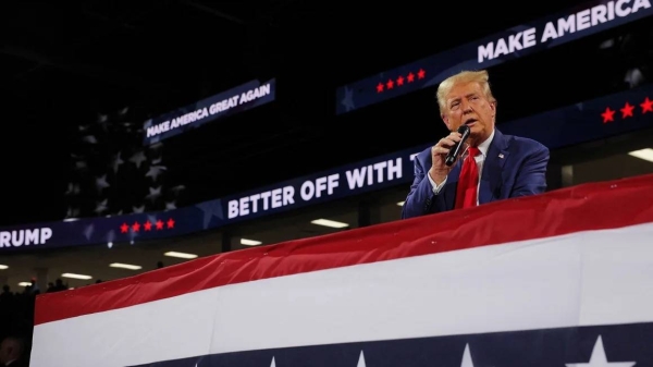 Republican presidential nominee, former President Donald Trump speaks at a campaign town hall meeting in Flint, Michigan, on September 17, 2024