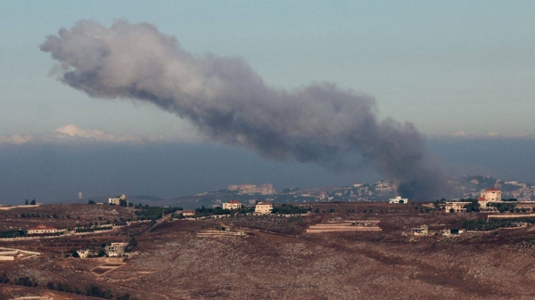 Smoke billows over southern Lebanon near the border with Israel on Thursday.