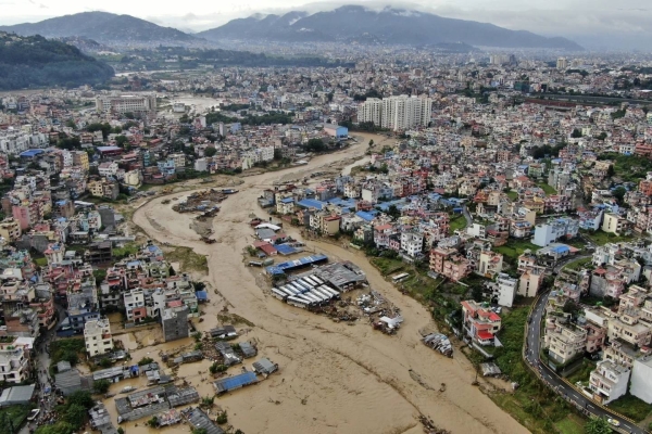 Flooding in Nepal kills at least 32, leaves 12 missing