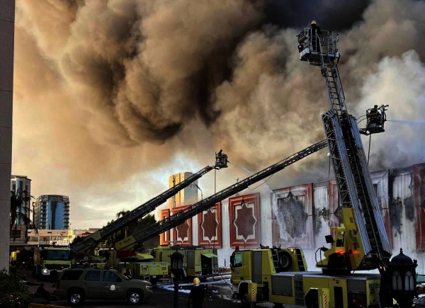 Civil Defense personnel battle the blaze that swept through Jeddah International Market on Sunday.