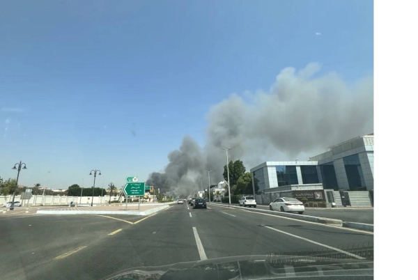 Civil Defense personnel battle the blaze that swept through Jeddah International Market on Sunday.