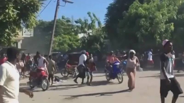 People could be seen fleeing the violence on motorbikes and on foot