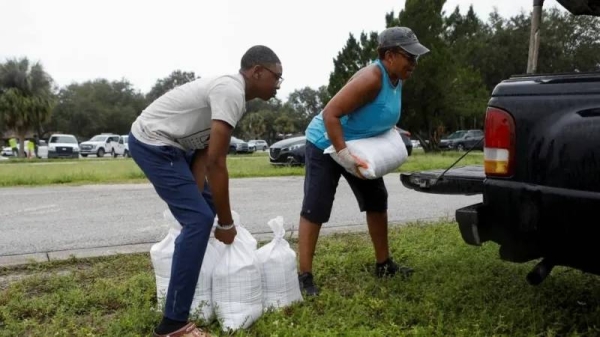 Preparations are under way, with residents filling sandbags ahead of the storm