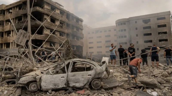 An air strike on the edge of the Dahieh area that completely destroyed one building and damaged adjacent buildings, including a large gynaecology clinic