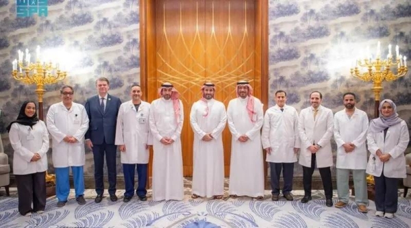 Saudi Crown Prince and Prime Minister Mohammed bin Salman receives the Saudi medical team that who performed the world's first fully robotic heart transplant, in Riyadh on Wednesday.
