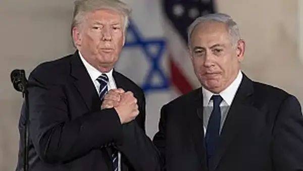 President Donald Trump and Israeli Prime Minister Benjamin Netanyahu shake hands at the Israel museum in Jerusalem, Tuesday, May 23, 2017