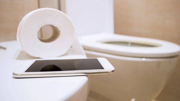 Leave your devices behind when you head to the bathroom, doctors say, warning too much time spent on the toilet can cause possible health problems