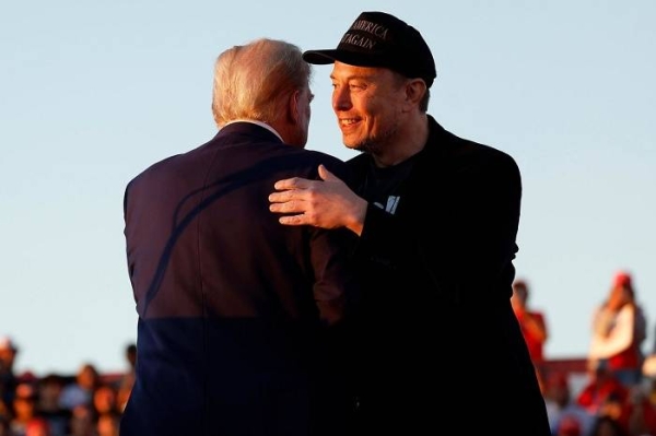 Elon Musk embraces Donald Trump during a campaign rally in Butler, Pennsylvania, on October 5.