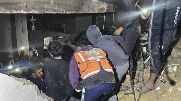 Rescuers searched rubble following Israeli strikes on Gaza City on Wednesday