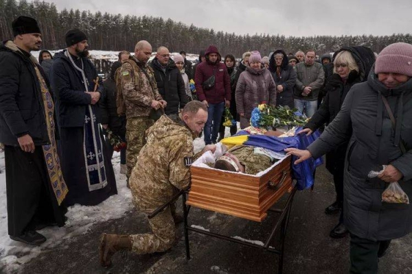 A Ukrainian serviceman bids farewell to comrade killed during fighting with Russian forces in Kursk oblast in Irpin, Kyiv region, Ukraine, Nov. 21, 2024