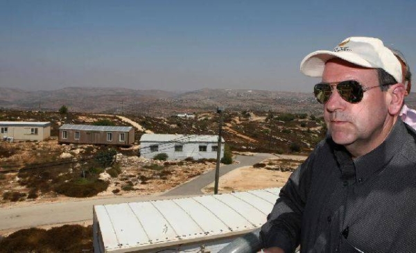 Donald Trump’s pick for US ambassador to Israel, Mike Huckabee, visits the West Bank Israeli settlement of Beit El, near Ramallah, on August 18, 2009