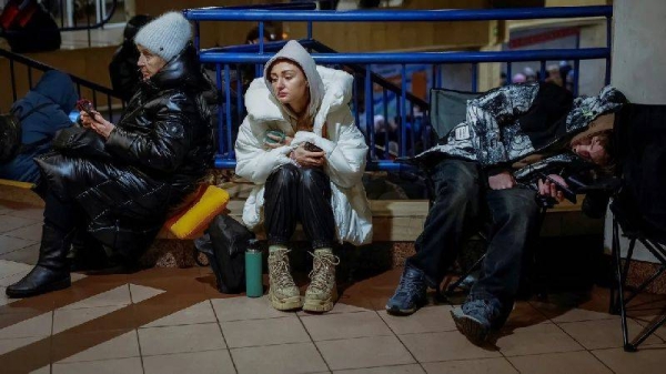 People take shelter inside a metro station in Kyiv during Russia's overnight attack