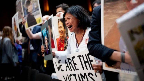 Family members of those killed in the Ethiopian Airlines Flight 302 and Lion Air Flight 610 at a congressional hearing in Washington with the head of Boeing in June 2024