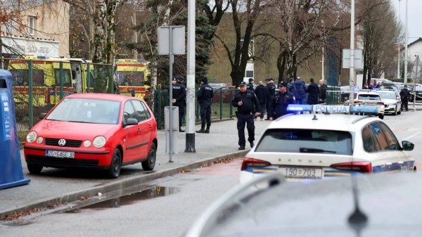 Police officers respond to a knife attack at a primary school in Zagreb, Croatia, on Friday