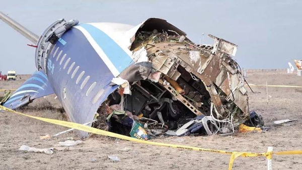 The wreckage of Azerbaijan Airlines Embraer 190 lays on the ground near the airport of Aktau, Kazakhstan, Wednesday, Dec. 25, 2024