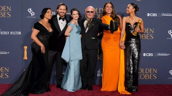 Adriana Paz, from left, Edgar Ramirez, Selena Gomez, Jacques Audiard, Karla Sofia Gascon, and Zoe Saldana with the award for best motion picture