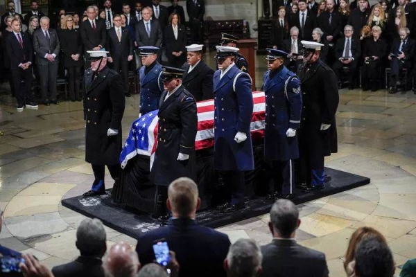 The flag-draped casket of former President Jimmy Carter arrives to lie in state at the rotunda of the U.S. Capitol Tuesday, Jan. 7, 2025