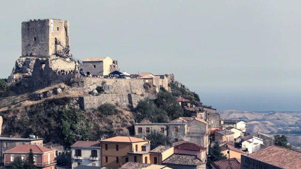 A view of the Castle of Conti D'Aquino and homes in Belcastro, Catanzaro, Italy