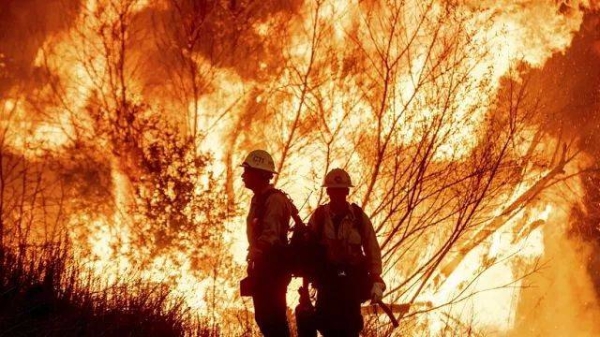 Fire crews battle the Kenneth Fire in the West Hills section of Los Angeles, Thursday, Jan. 9, 2025