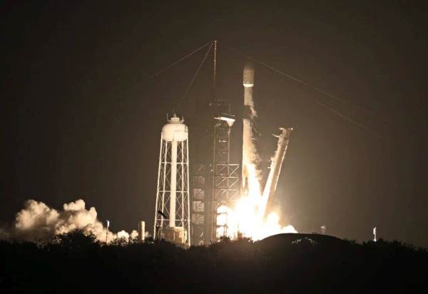 A SpaceX Falcon 9 rocket, carrying Firefly Aerospace's Blue Ghost and Ispace's Resilience lunar landers, lifts off Wednesday from Launch Complex 39A at the Kennedy Space Center in Cape Canaveral,