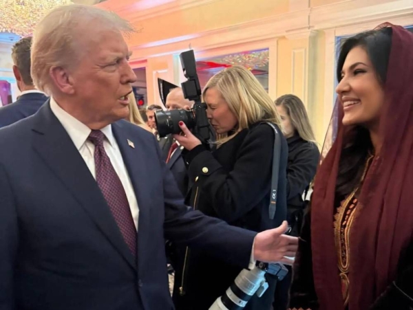 Saudi Ambassador to the United States Princess Reema bint Bandar is seen with Donald Trump during his inauguration as US President in Washington on Monday.
