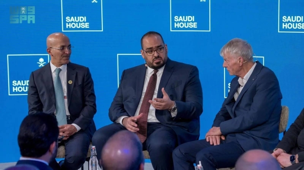 Saudi Finance Minister Mohammed Al-Jadaan and Minister of Economy and Planning Faisal Al-Ibrahim attending a session at the Saudi House pavilion in Davos.