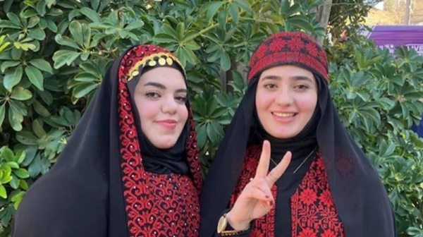 Raghad, right, and her sister Hedaya were getting ready to meet their father