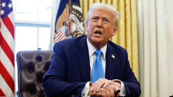 President Donald Trump speaks with reporters in the Oval Office of the White House on February 4, 2025 in Washington, DC