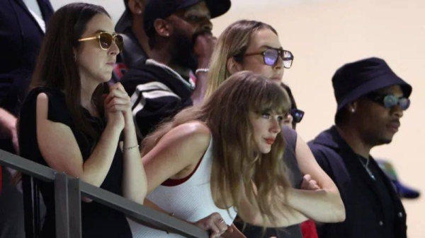 Taylor Swift - pictured in between two of the Haim sisters - watching boyfriend Travis Kelce's Chiefs at her second Super Bowl appearance