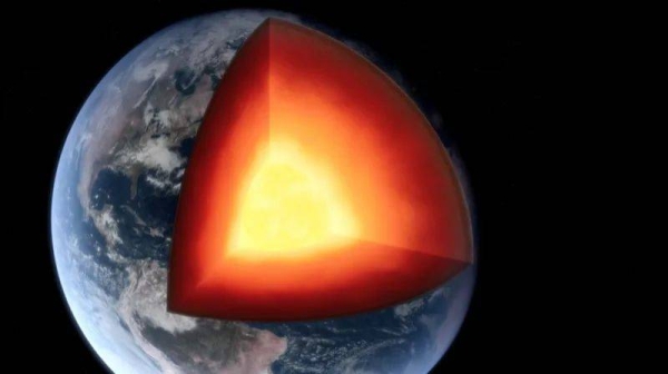 A 3D illustration of Earth with a slice cut out revealing the layers including the core