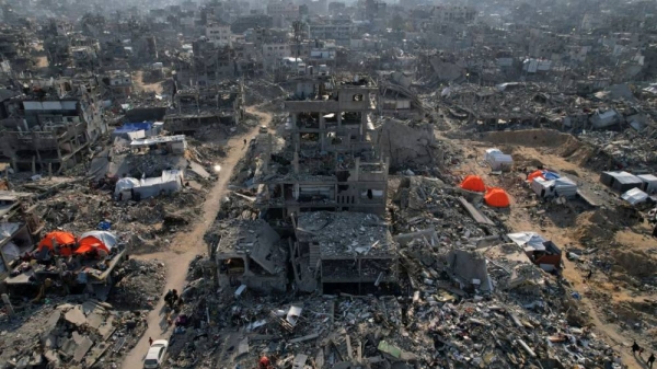 An aerial photograph taken by a drone shows tents amidst the destruction caused by the Israeli air and ground offensive in Beit Lahiya, northern Gaza Strip, on Monday, Feb. 17