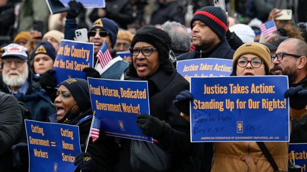 Labor union activists rally in support of federal workers during a protest on Capitol Hill in Washington,  February 11, 2025