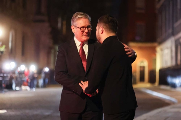 UK Prime Minister Keir Starmer warmly embraces and greets Ukrainian President Volodymyr Zelenskyy at Downing Street. 