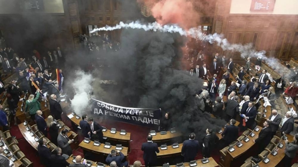 Smoke bombs and flares are released in Serbia's parliament in Belgrade, 4 March 2025