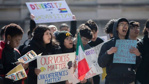 Students rallied at the University of Iowa campus in Iowa City last week in response to the university's plan to discontinue three living learning communities focused on Latino, Black and LGBTQ  experiences