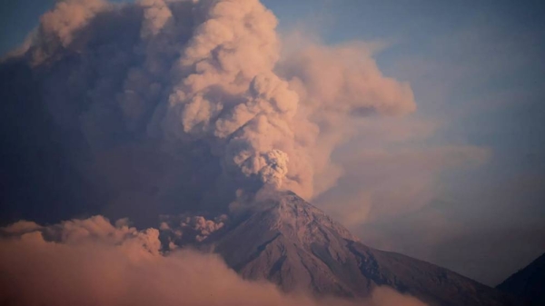 Volcán de Fuego expels a thick cloud of ash as seen from Palin, Guatemala, Monday 10 March 2025