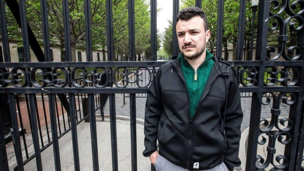 Mahmoud Khalil stands outside the gates of the Columbia University campus in New York on April 30, 2024