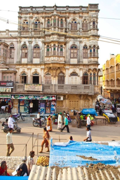 The buildings contain various elements of European architecture, including gabled roofs, pilasters and columns