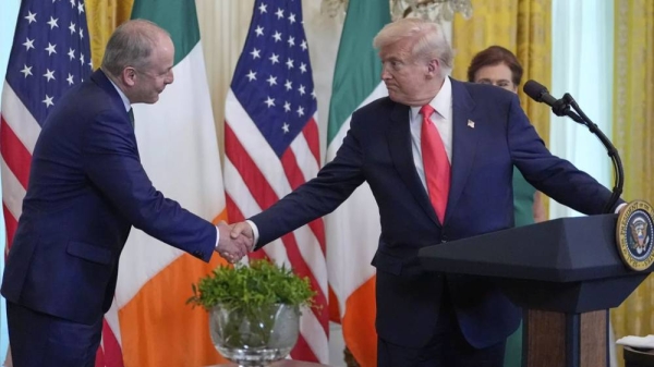 Ireland's Prime Minister Micheál Martin shakes hands with President Donald Trump during an event in the East Room of the White House in Washington, Wednesday, March 12, 2025. -