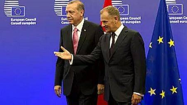 Turkish President Recep Tayyip Erdogan greeted by European Council President Donald Tusk prior to a meeting at the EU Council building in Brussels in 2015