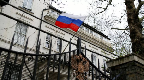 A Russian flag flies outside the Consular Section of the Russian Embassy in London (file photo)