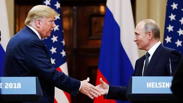 US President Donald Trump shakes hand with Russian President Vladimir Putin at the end of a press conference in Helsinki, 16 July, 2018