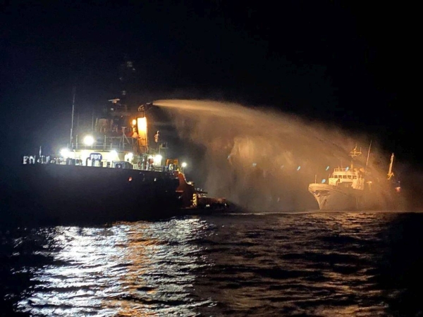 A tug boat assists Freedom Flotilla Coalition vessel Conscience off the coast of Malta. 