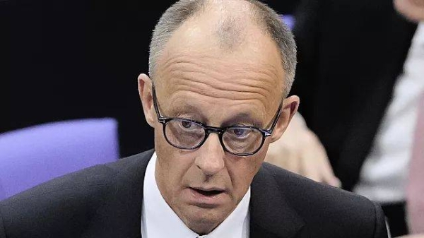 Friedrich Merz reacts after he was not elected new Chancellor in the first voting process at the parliament Bundestag in Berlin