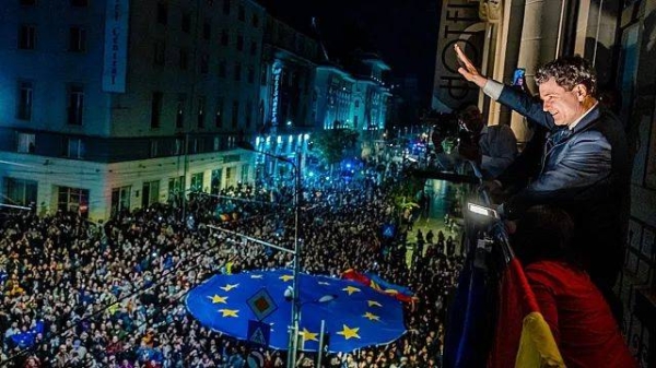 Romanian Presidential candidate Nicusor Dan celebrates his electoral victory in Bucharest